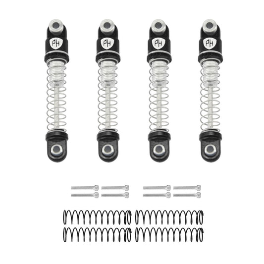 Four black shock absorbers with springs and hardware on a white background